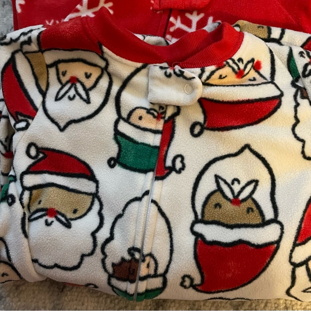 Two Christmas 24 month Carters fleece footies.